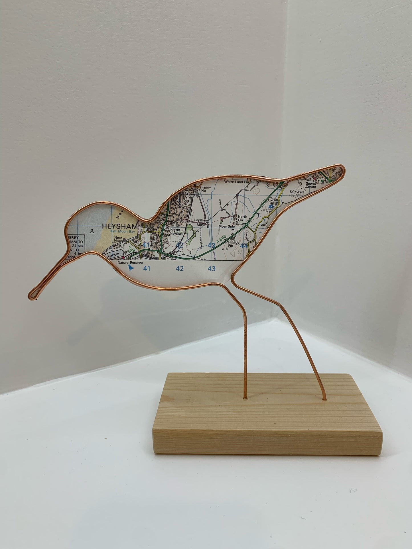 Handmade Wire Sculptures Embellished with Local Maps