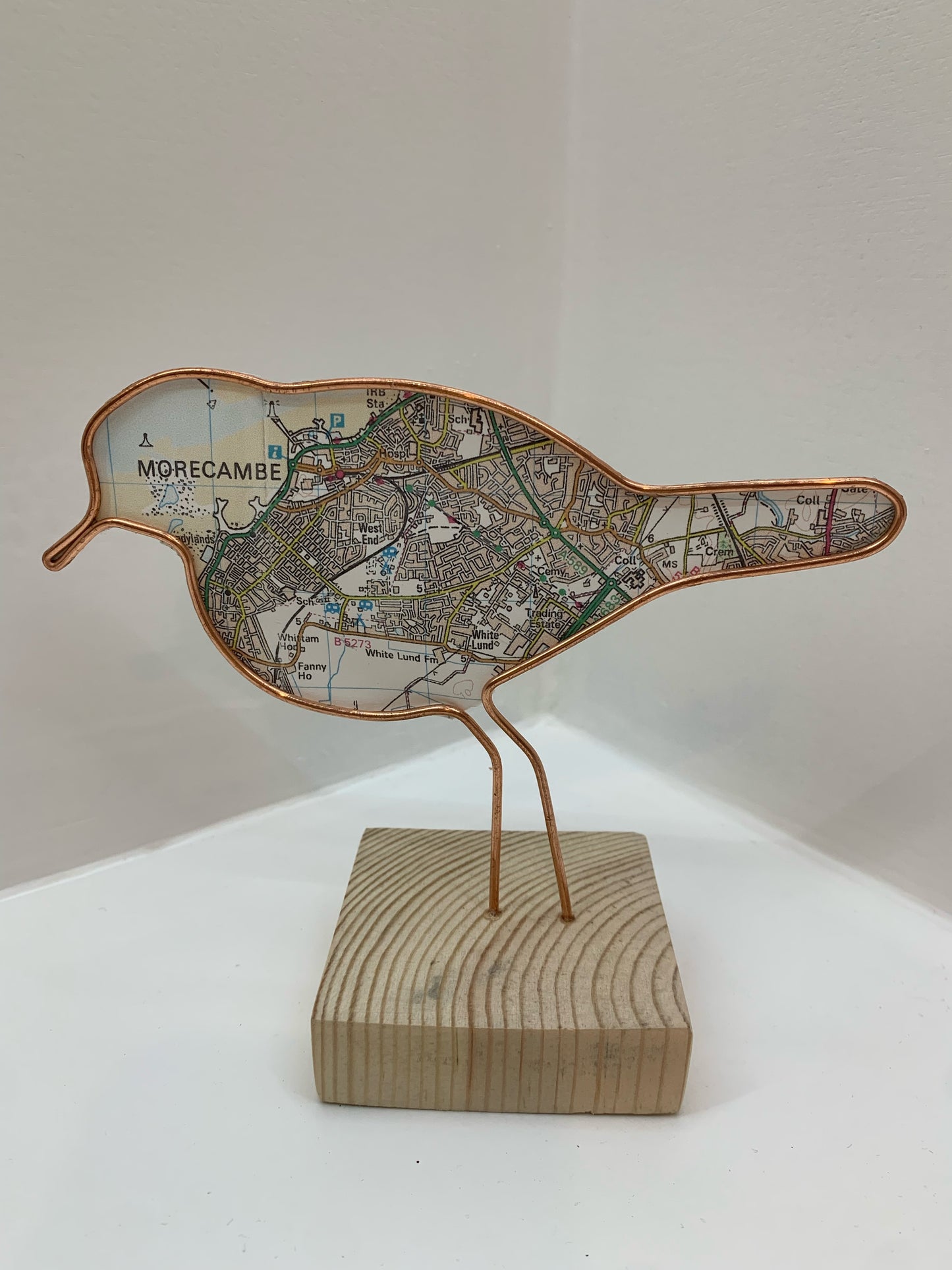 Handmade Wire Sculptures Embellished with Local Maps