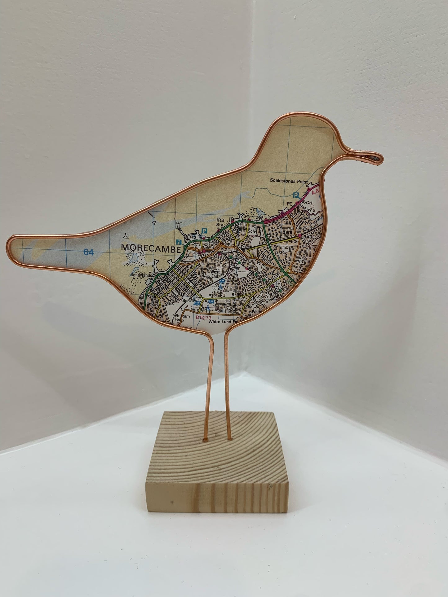 Handmade Wire Sculptures Embellished with Local Maps