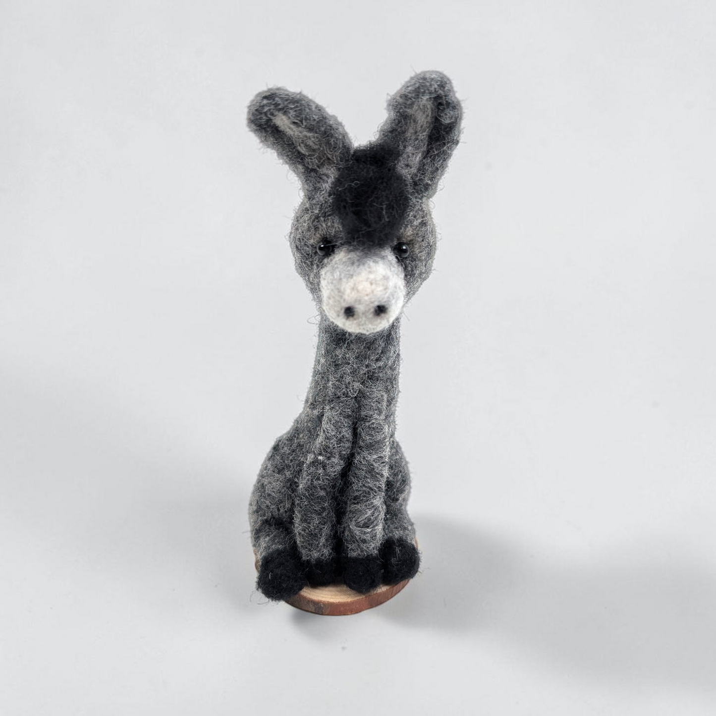 Needle Felted Sitting Donkey on Wooden Base | Lin Dean