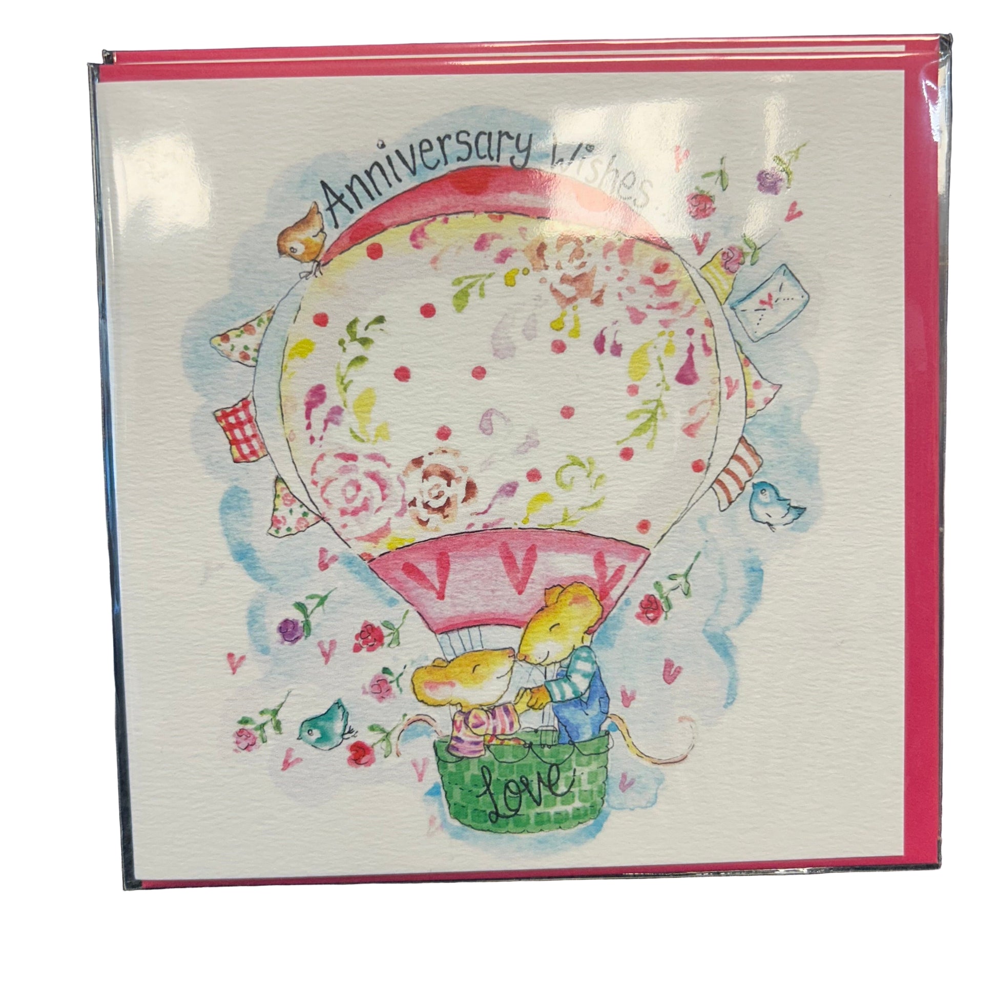 Greeting card with a hot air balloon design and 'Anniversary Wishes' text.