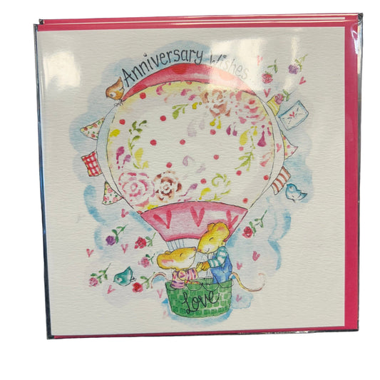 Greeting card with a hot air balloon design and 'Anniversary Wishes' text.
