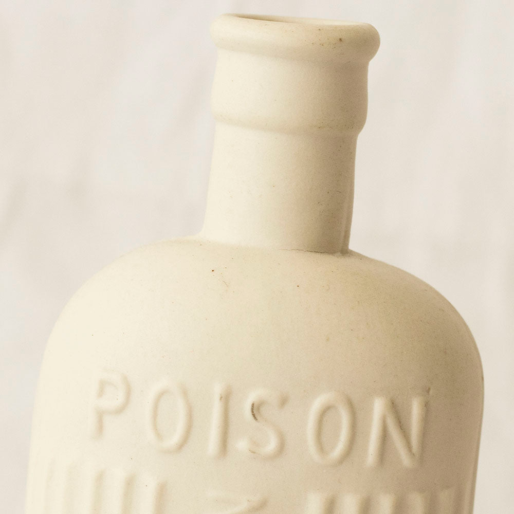 "Porcelain Cast Poison Bottle"